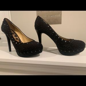 Black studded pumps